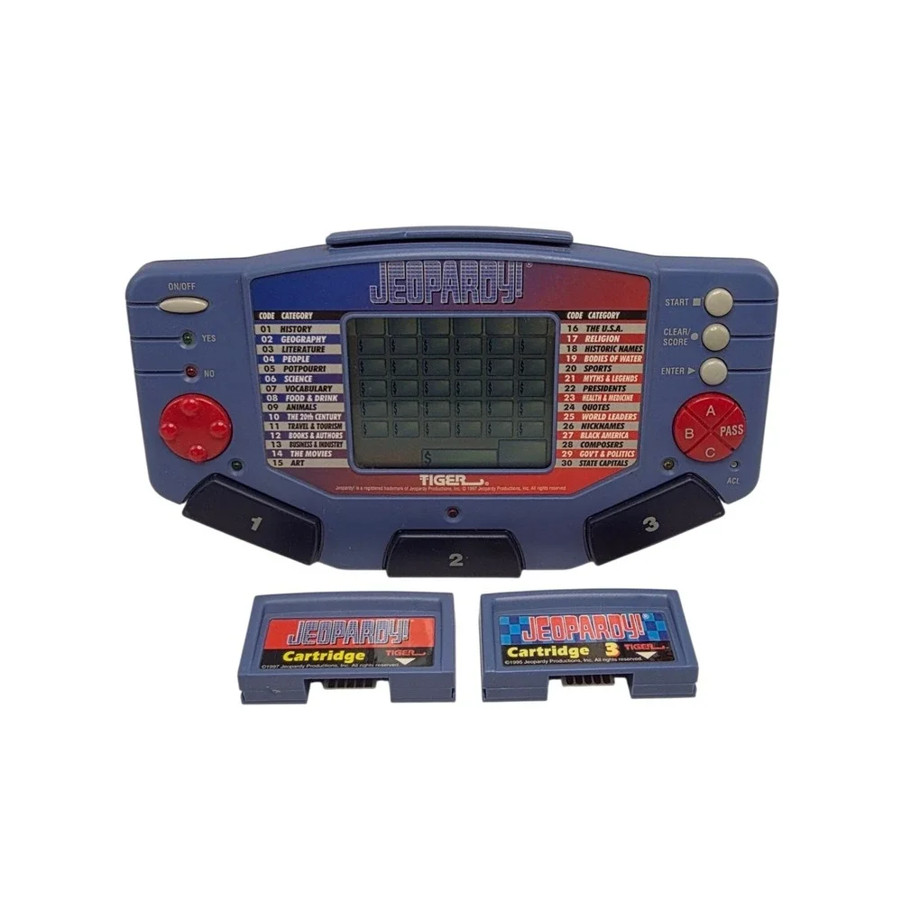Tiger Electronics Jeopardy Hand Held Game With Cartridges & Answer Question Book
